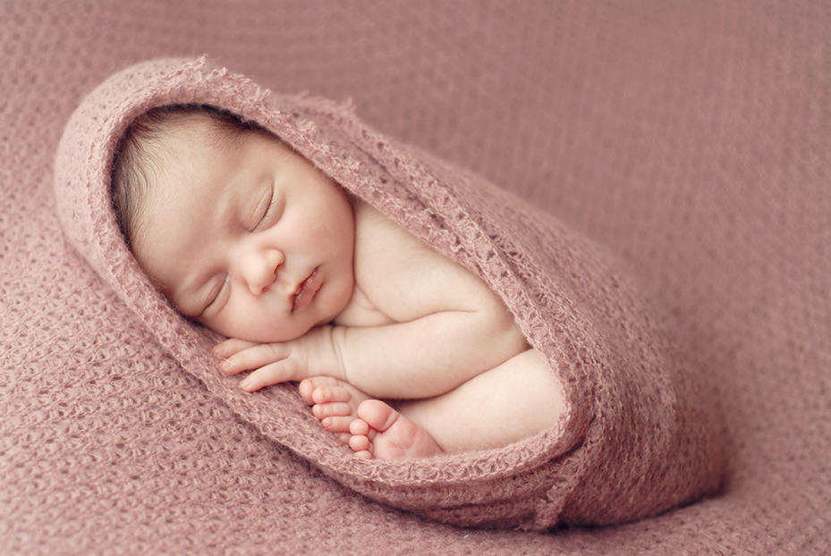 newborn baby girl wrapped