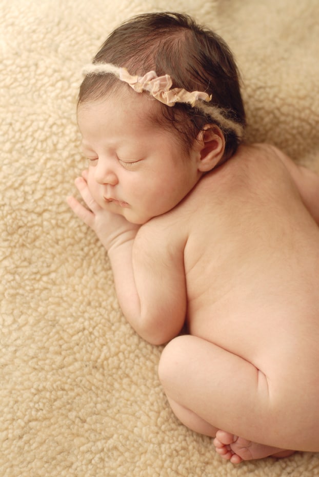 baby girl posed newborn