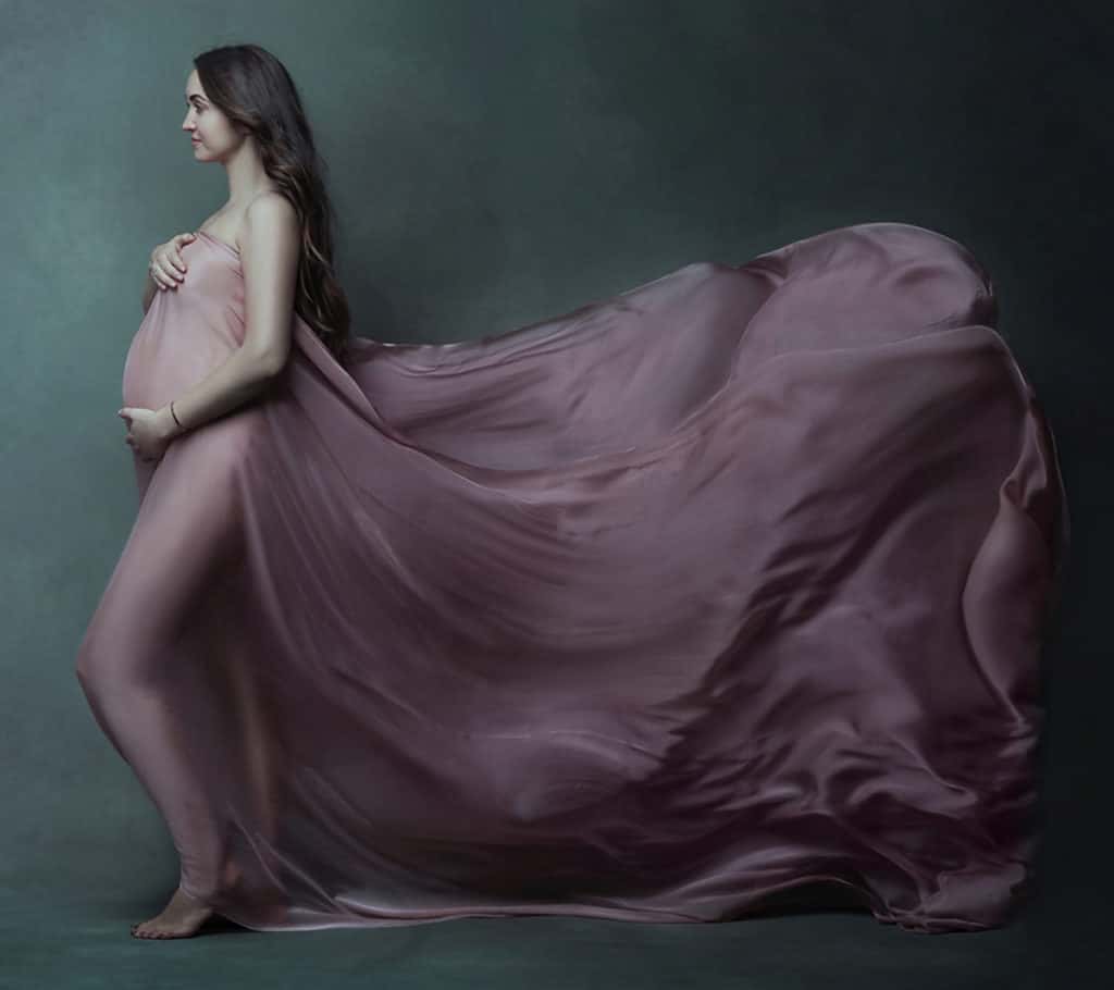 maternity session in flowing fabric