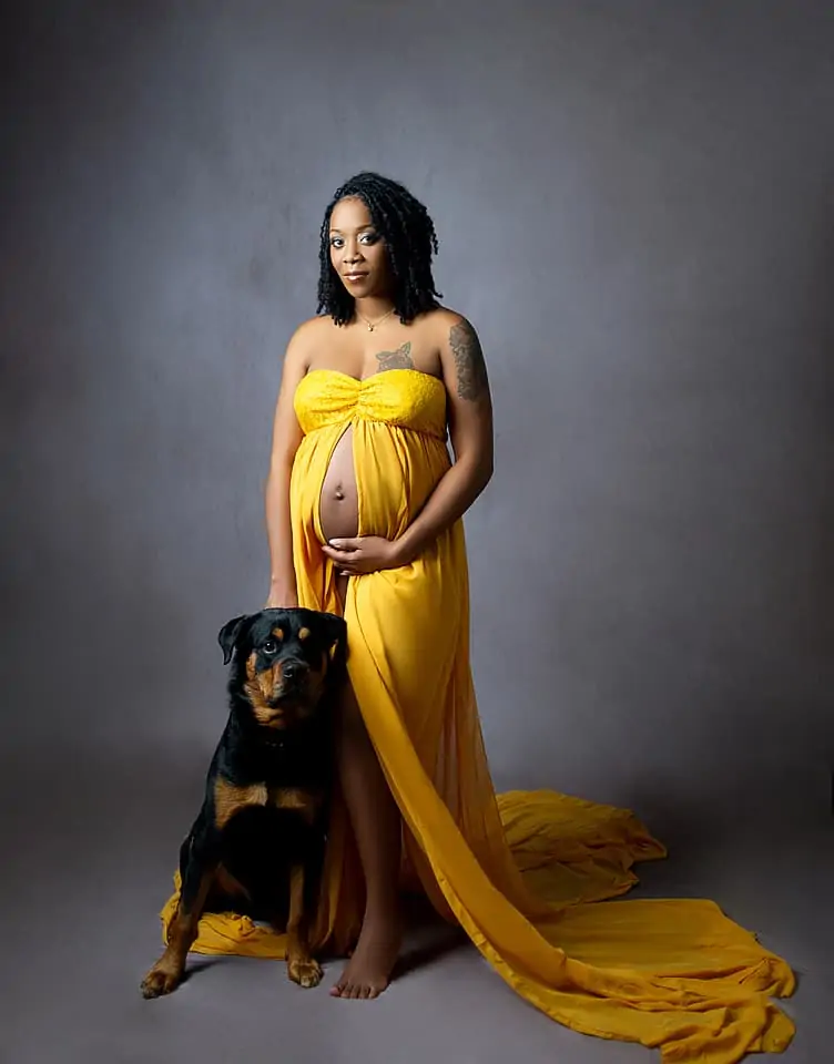 image of pregnant mom with her dog 