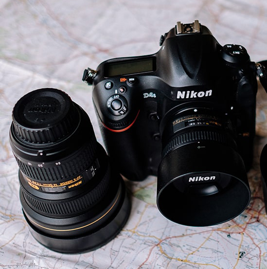 picture of a nikon camera and lens