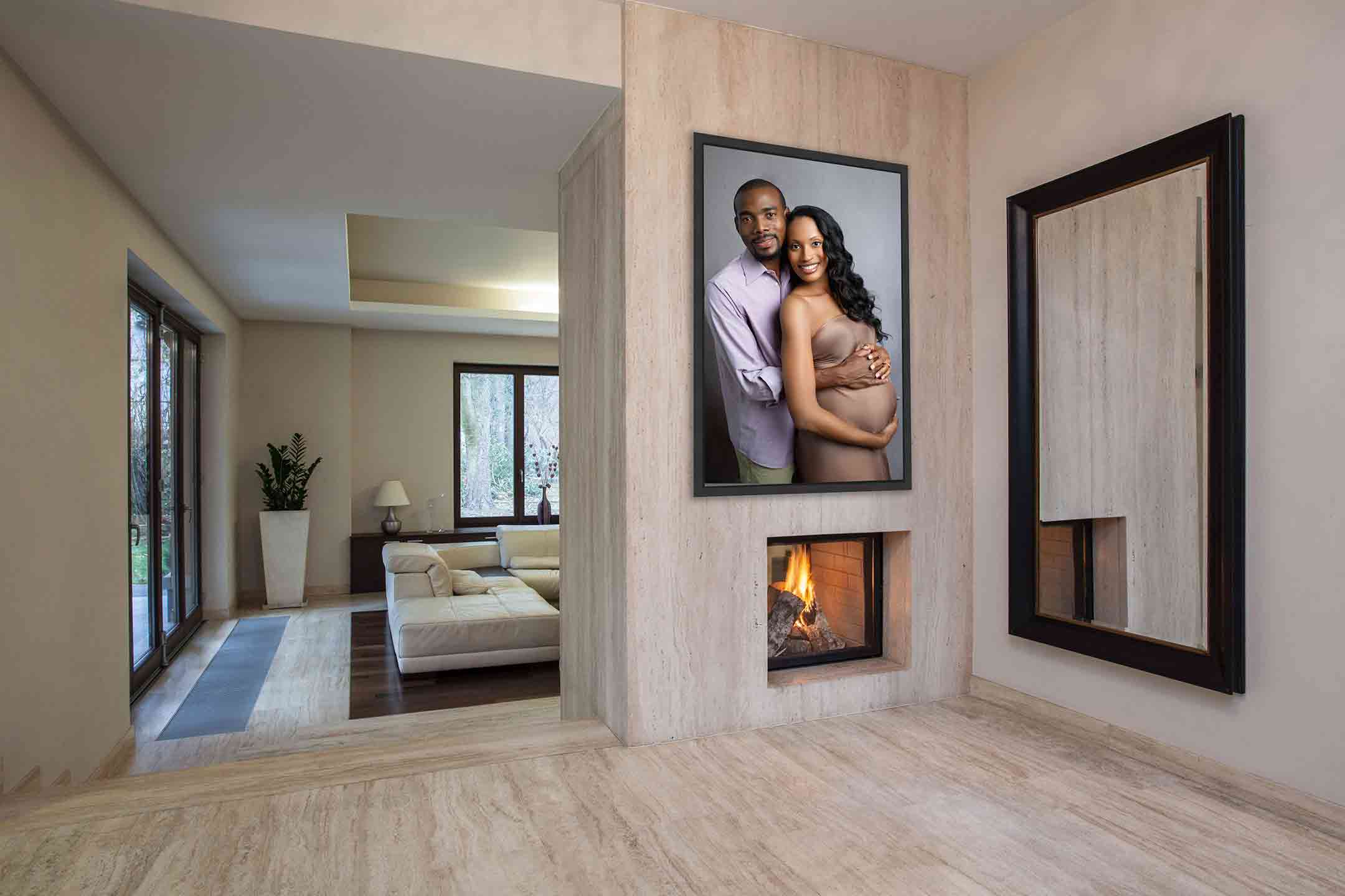 celebrating black fatherhood with picture of a black maternity session image hang in their home